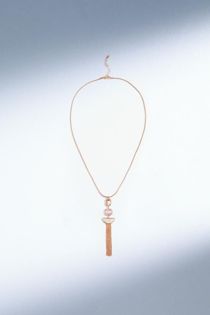 Long length gold tone necklace